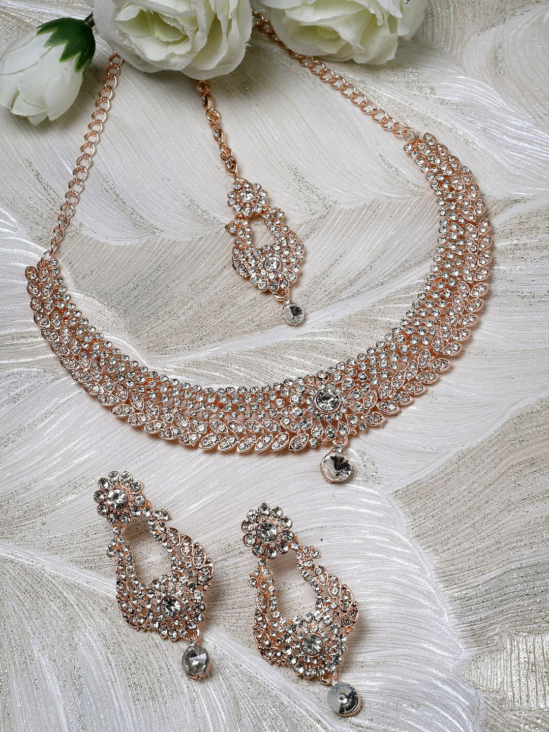 

Sukkhi Women Rose Gold Plated American Diamond Studded Jewellery Set