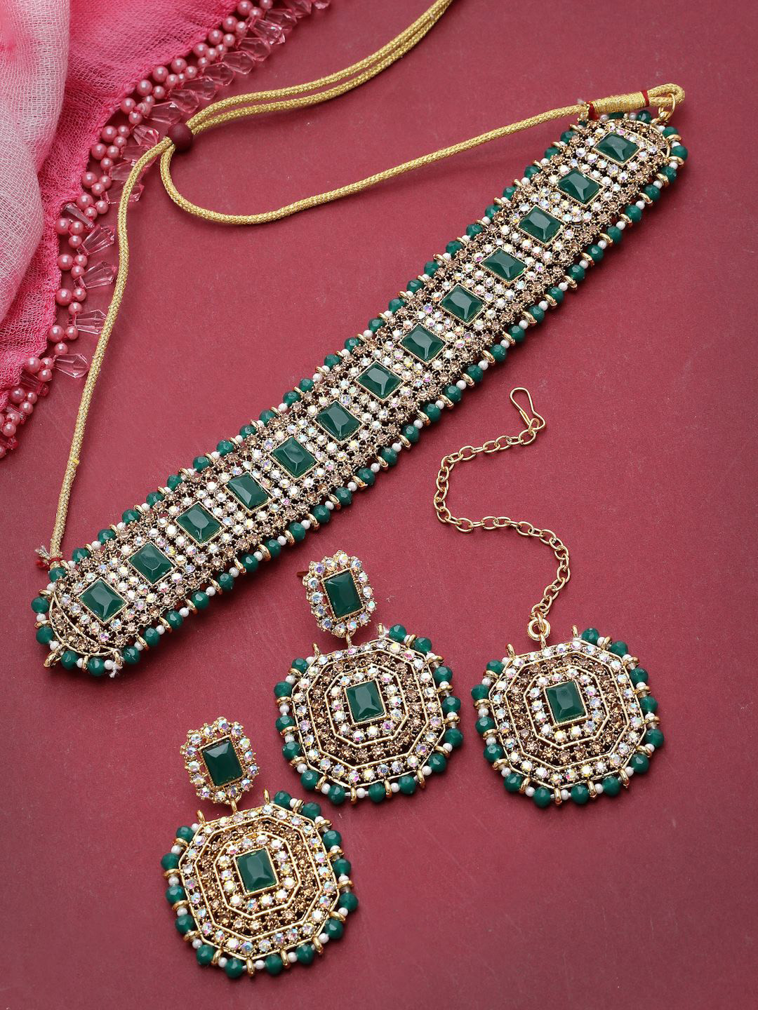 

Sukkhi Traditional Gold Plated Kundan Studded & Beaded Jewellery Set