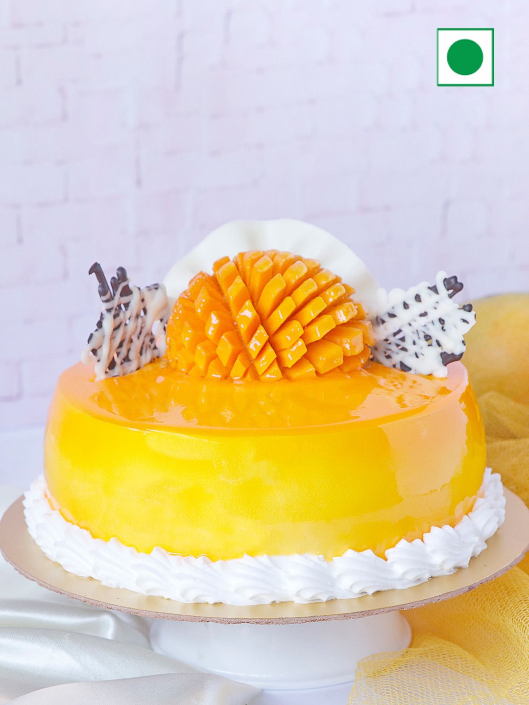 

IGP Mango Flavour Eggless Round Cake-Half kg, Yellow