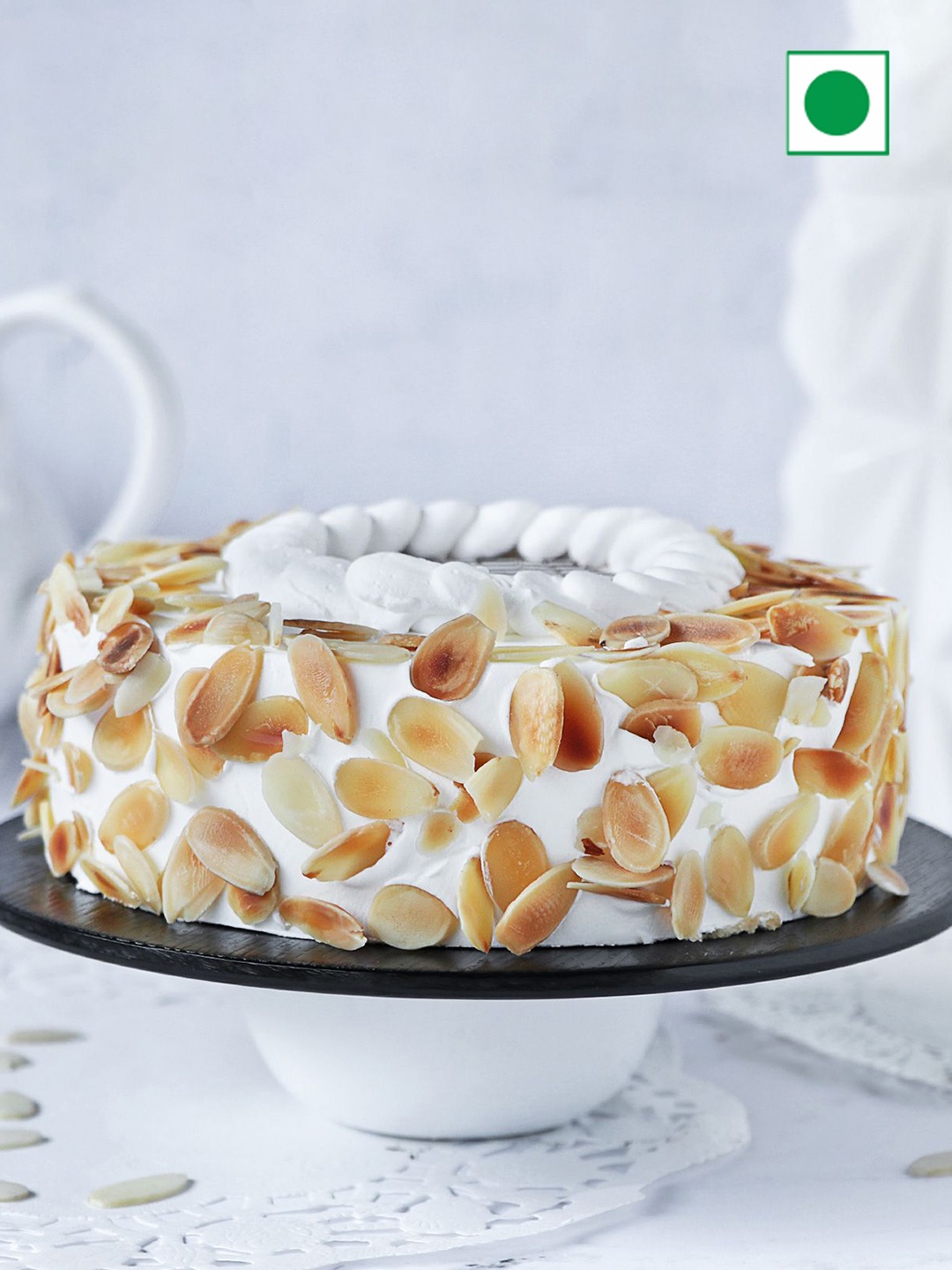 

IGP Vanila Almond Eggless Round Cake- 1Kg, White