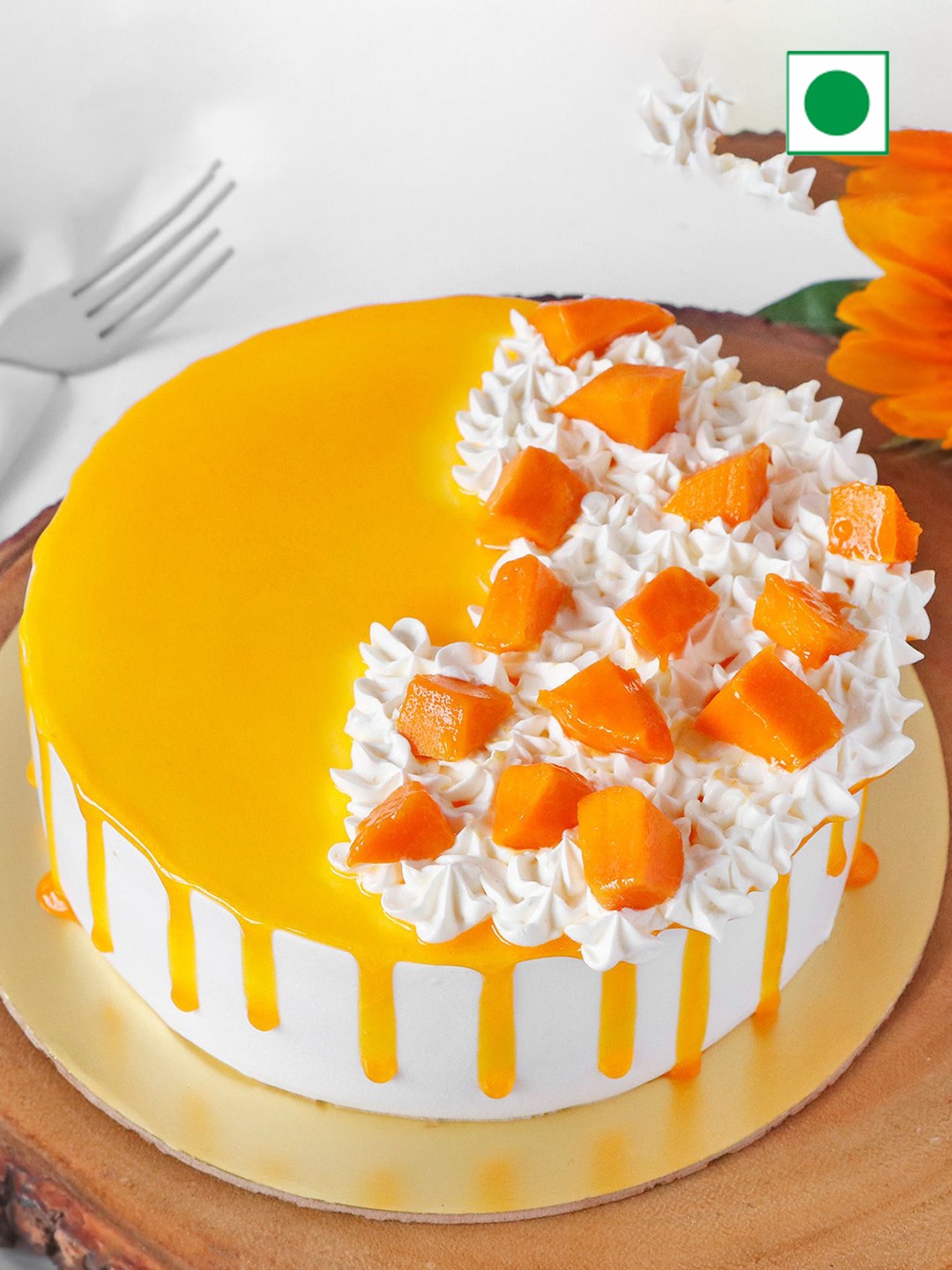 

IGP Mango Flavour Eggless Round Cake - Half Kg, Yellow