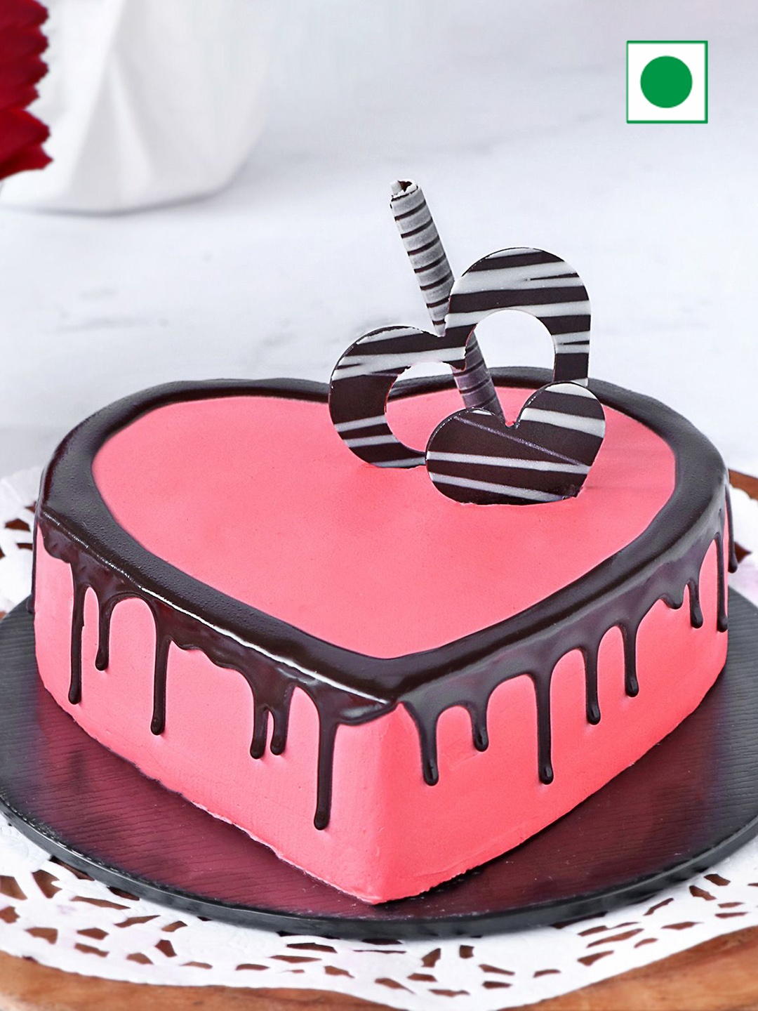 

IGP Strawberry Flavour Eggless Heart-Shaped Cake -Half kg, Pink