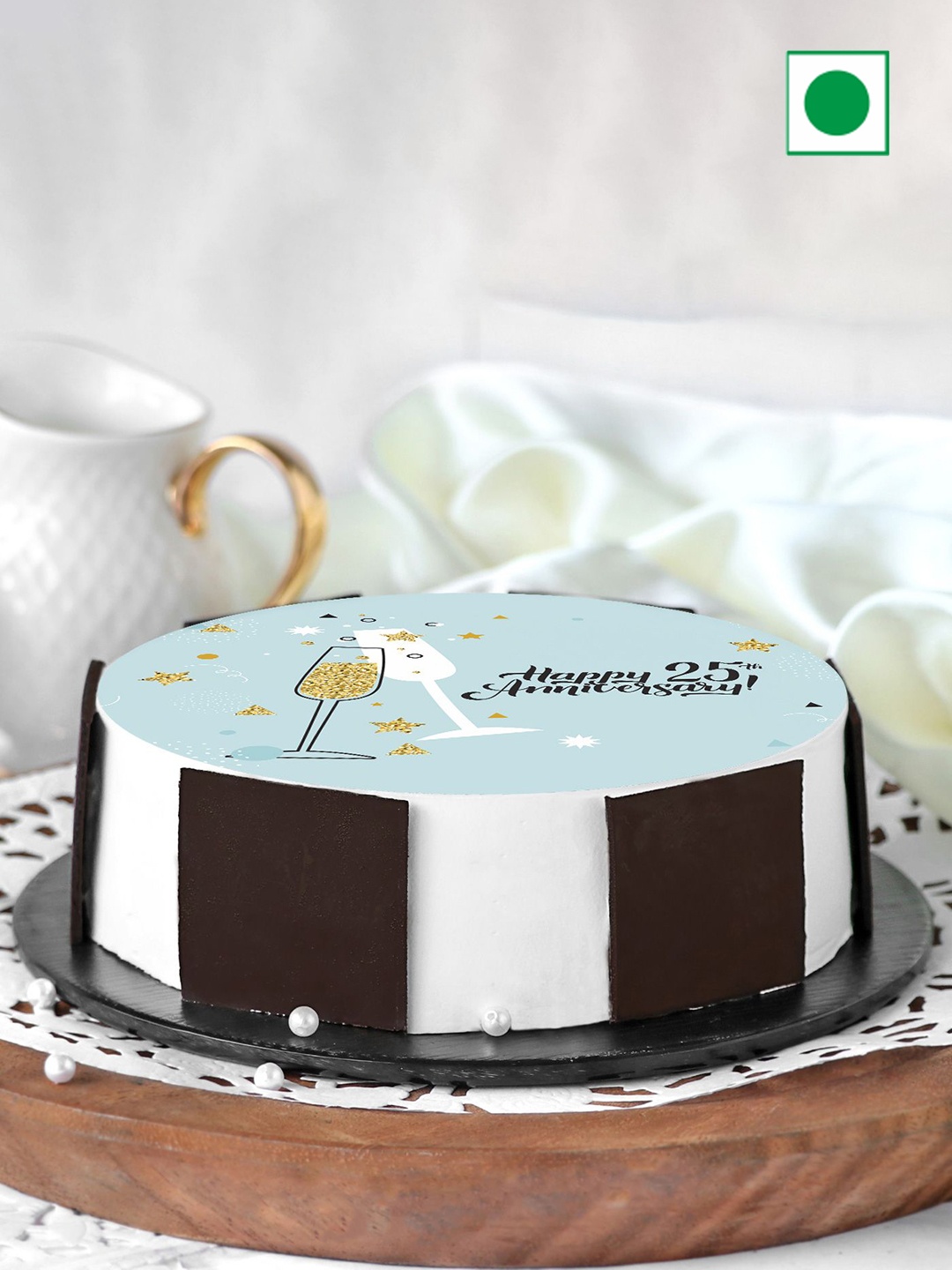 

IGP Black Forest Flavour Eggless Round Cake - 1kg, Blue