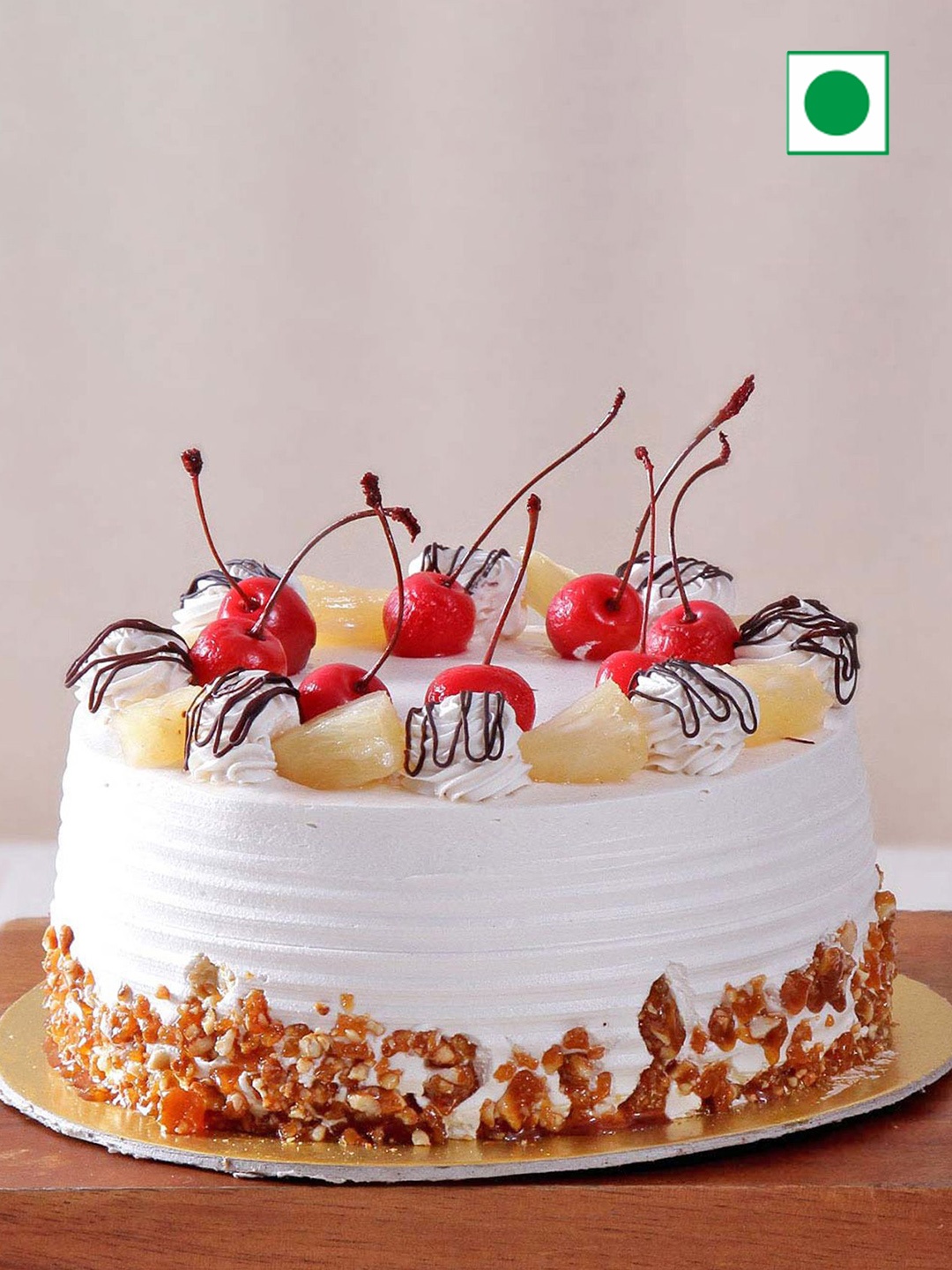 

IGP Pineapple Flavour Eggless Round Cake- 1 Kg, White