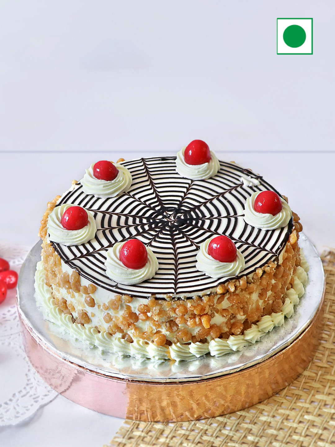

IGP Butterscotch Flavour Eggless Round Cake - 1 kg, Red
