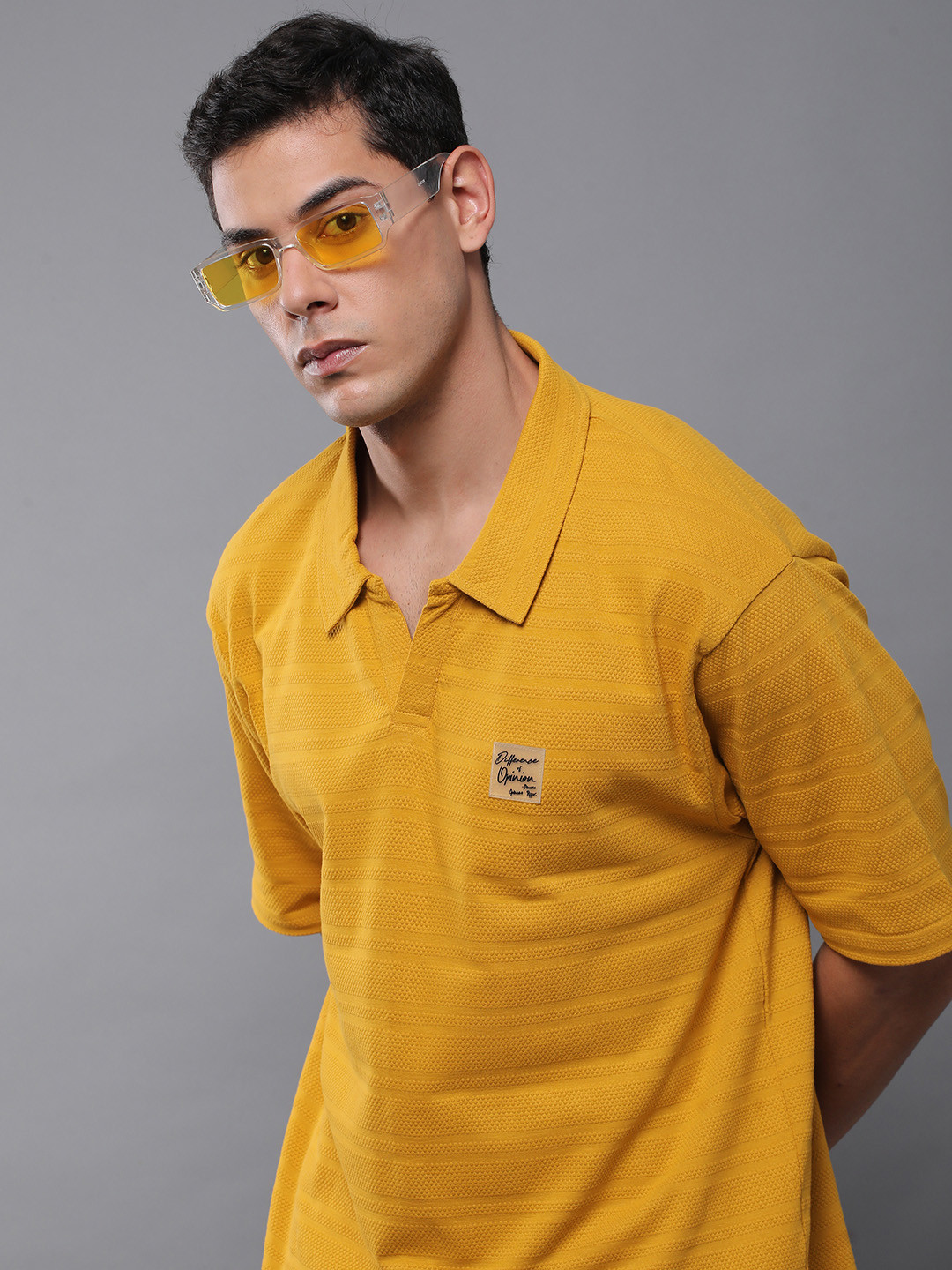 

Difference of Opinion Men Solid Popcorn Structure Oversized Polo T-Shirt, Yellow