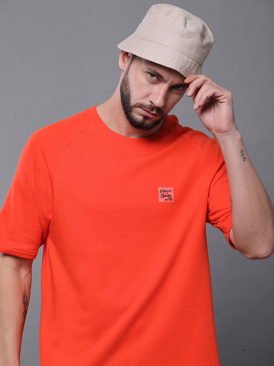 

Difference of Opinion Men Solid Ultra Soft Drapey Cotton Raglan T-Shirt, Orange