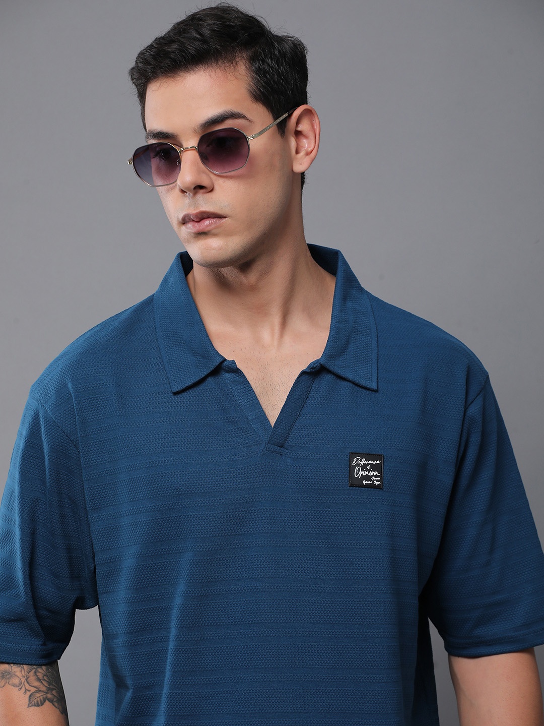 

Difference of Opinion Men Solid Popcorn Structure Oversized Polo T-Shirt, Turquoise blue