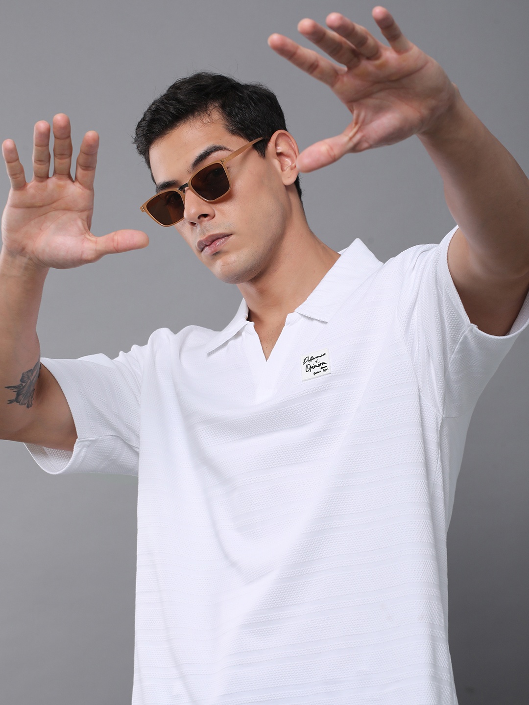 

Difference of Opinion Men Solid Popcorn Structure Oversized Polo T-Shirt, White