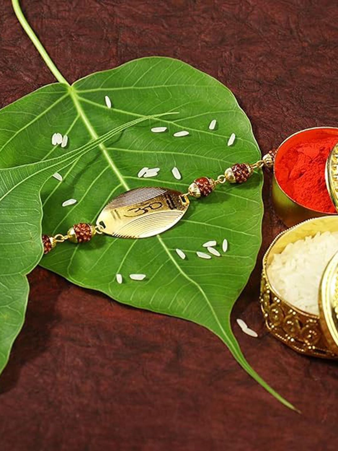 

Peora Traditional Gold Plated Om Rudraksha Rakhi With Rakshabandhan Greeting Card