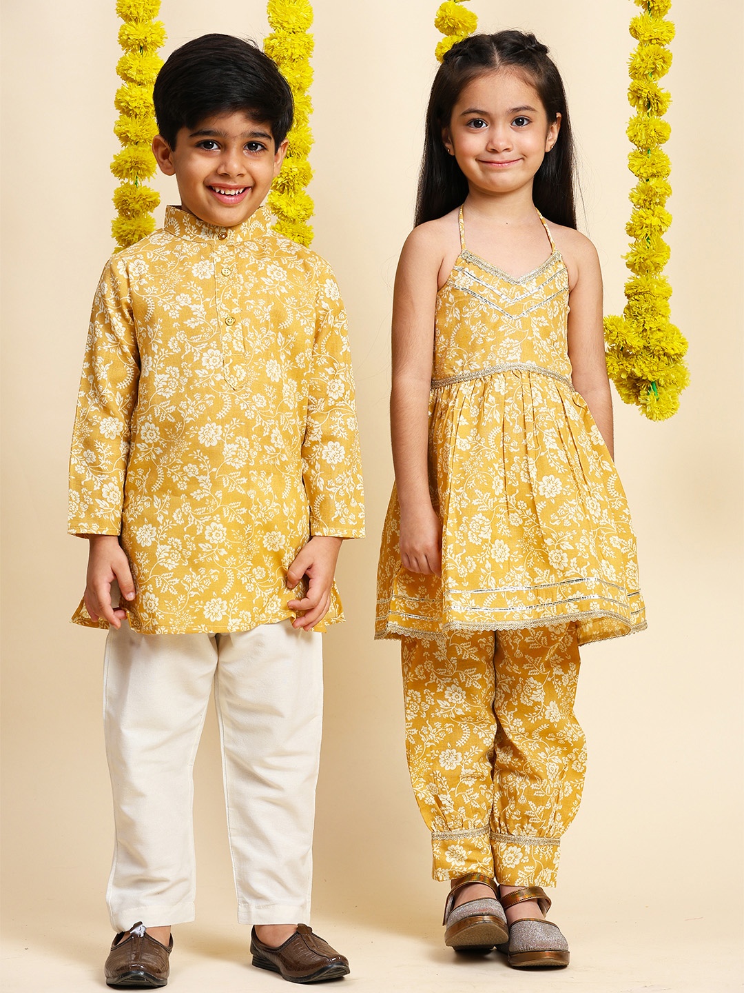 

Cutiekins Girls Floral Halter Neck Gotta Patti Pure Cotton Empire A-Line Kurta With Salwar, Mustard
