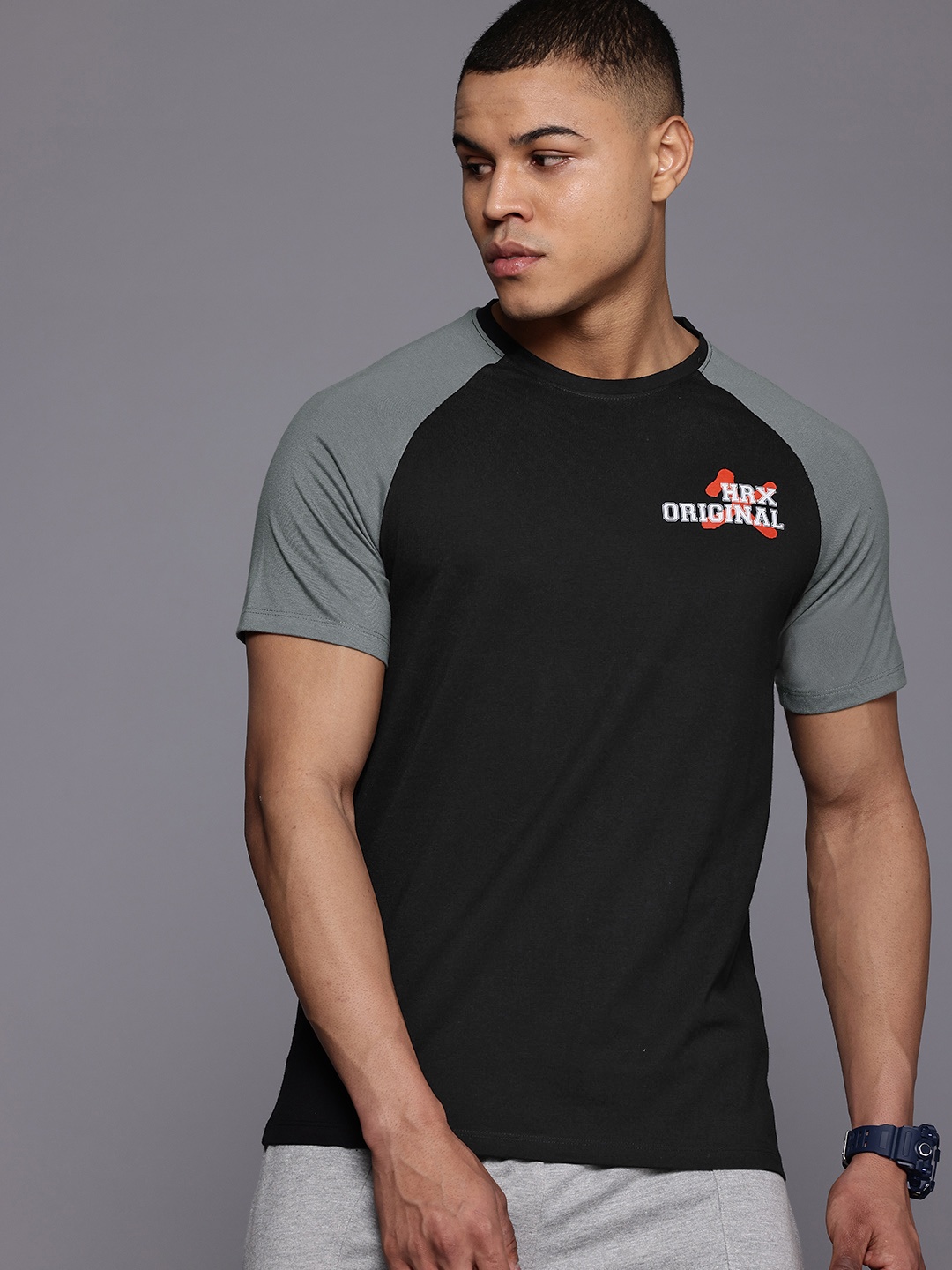 

HRX by Hrithik Roshan Men Colourblocked Sports T-shirt, Black