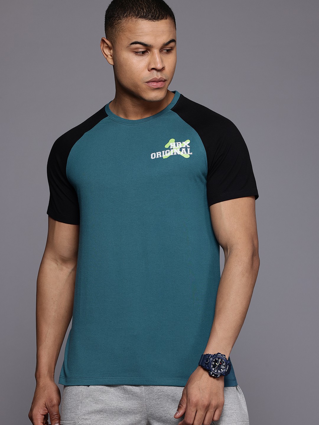 

HRX by Hrithik Roshan Men Colourblocked Sports T-shirt, Teal