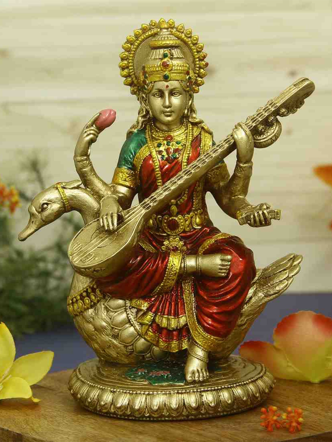 

HANDICRAFTS PARADISE Gold toned & Red Religious Saraswati Idol Showpiece