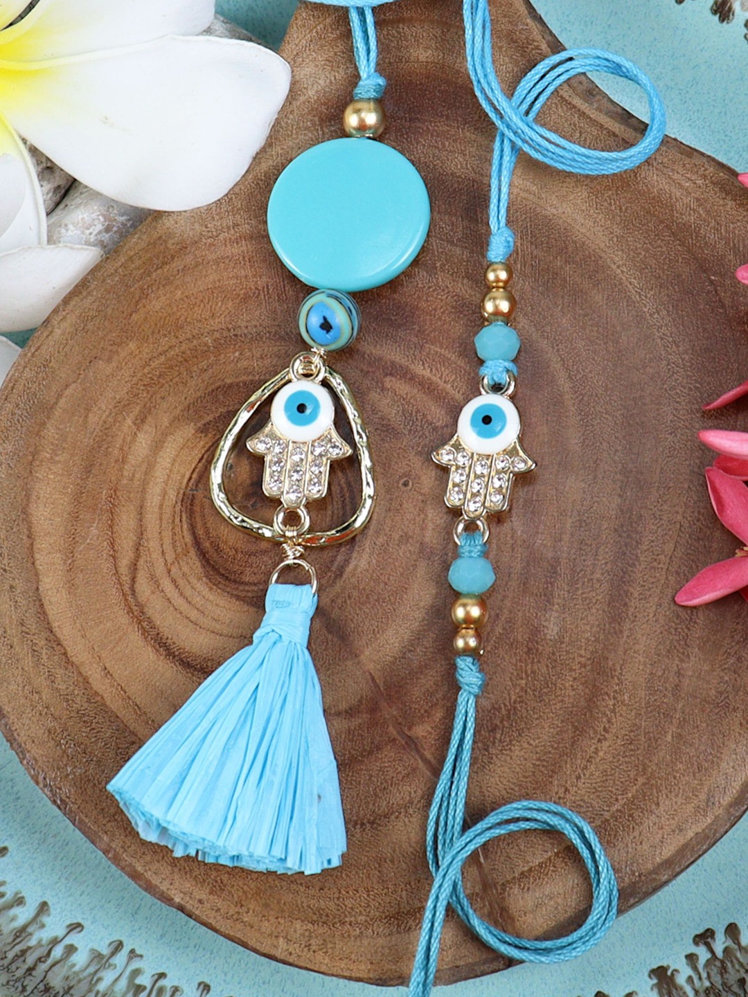 

Asthetika Beaded Evil Eye Bhaiya Bhabhi Rakhis with Roli Chawal, Blue