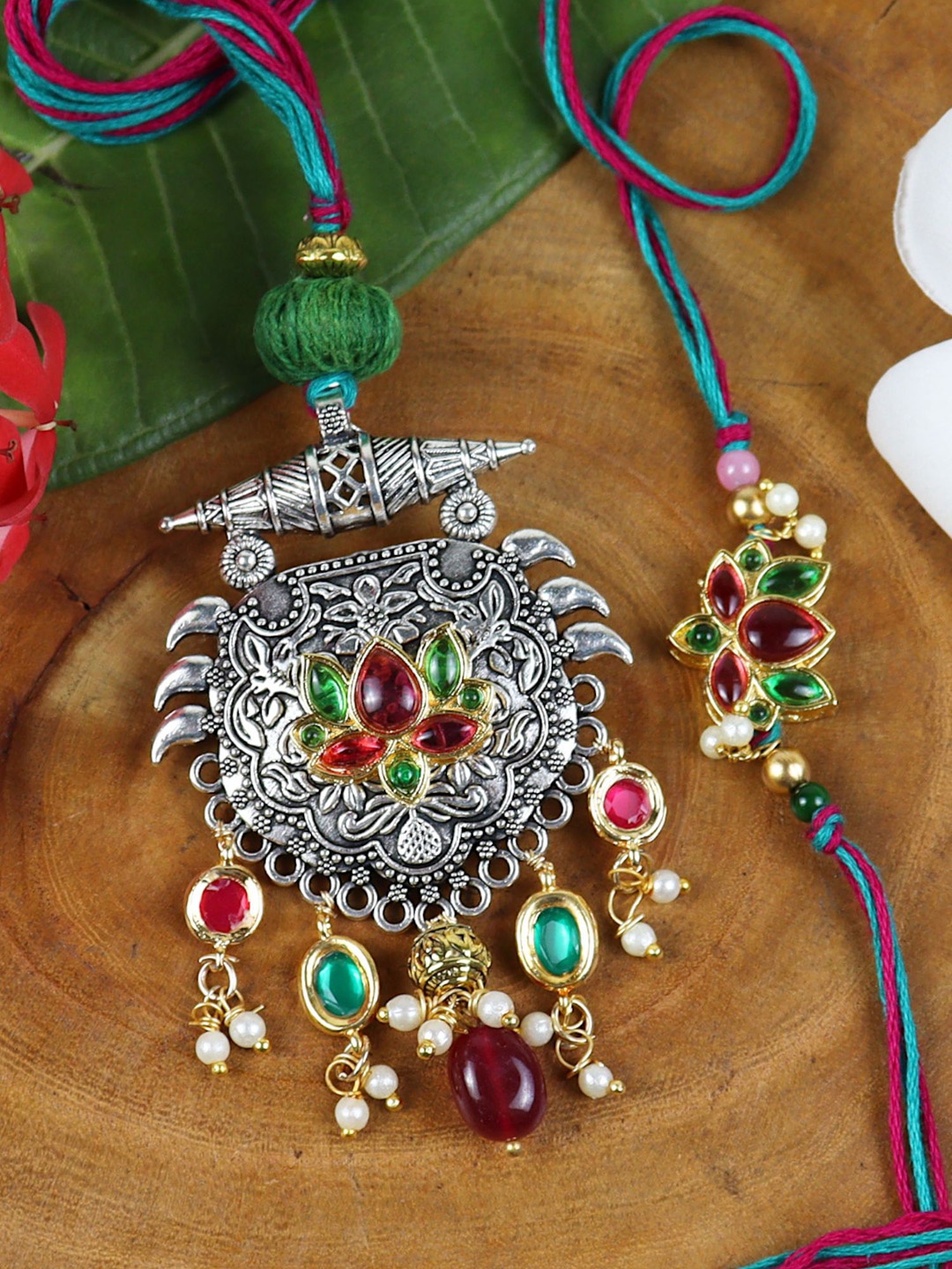 

Asthetika Oxidized Pendant Kundan Bhaiya Bhabhi Rakhi With Roli Chawal, Red