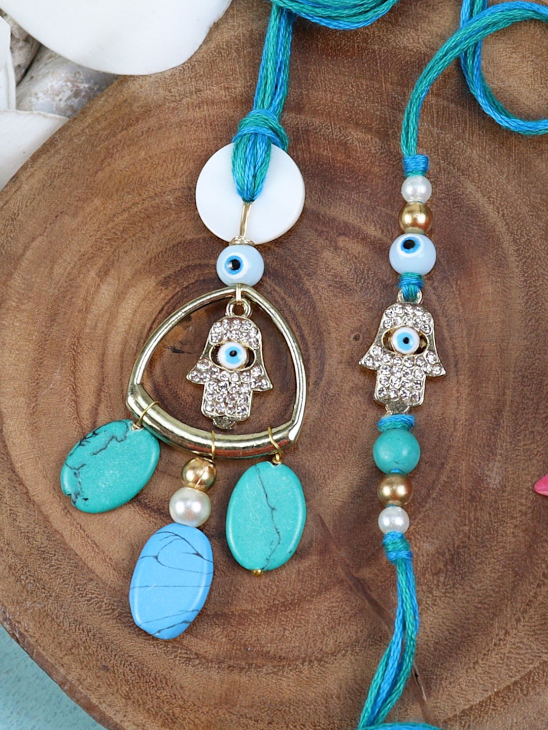 

Asthetika Hamsa Evil Eye Bhaiya Bhabhi Rakhi With Roli Chawal, Blue
