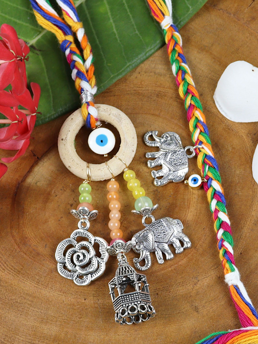 

Asthetika Oxidized Charms Evil Eye Bhaiya Bhabhi Rakhi with Roli Chawal, Red