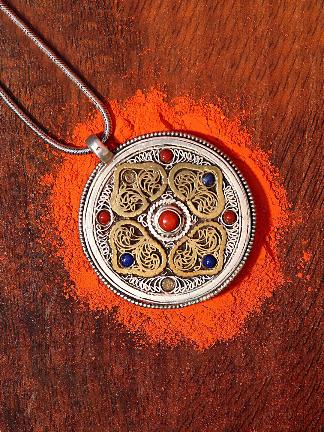 

Exotic India Sterling Silver Plated Circular Shaped Pendant