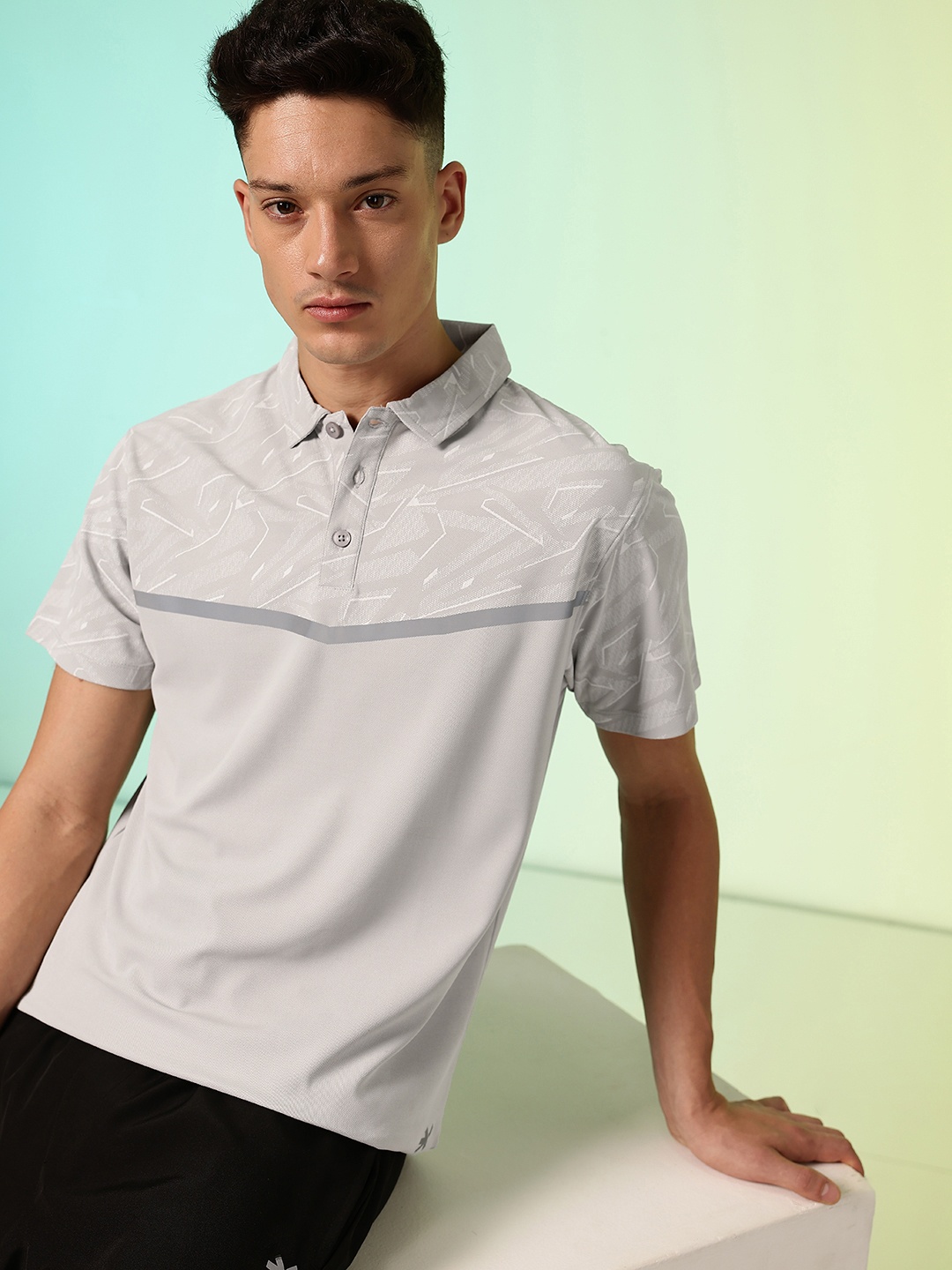 

HRX by Hrithik Roshan Men Brand Logo Printed Polo Collar Tennis T-shirt, Grey