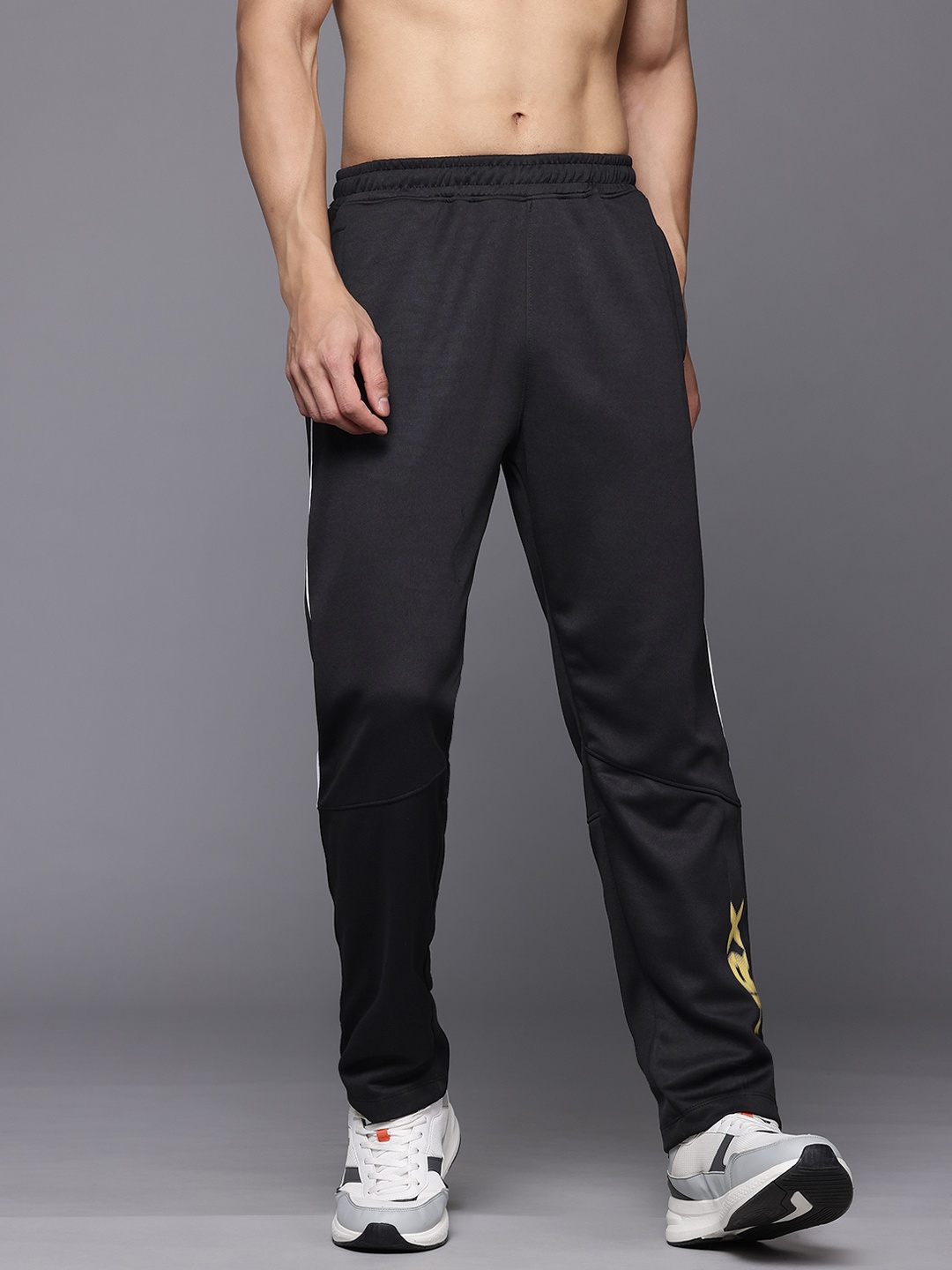 

HRX by Hrithik Roshan Men Brand Logo Print Detail Mid-Rise Rapid-Dry Running Track Pants, Black