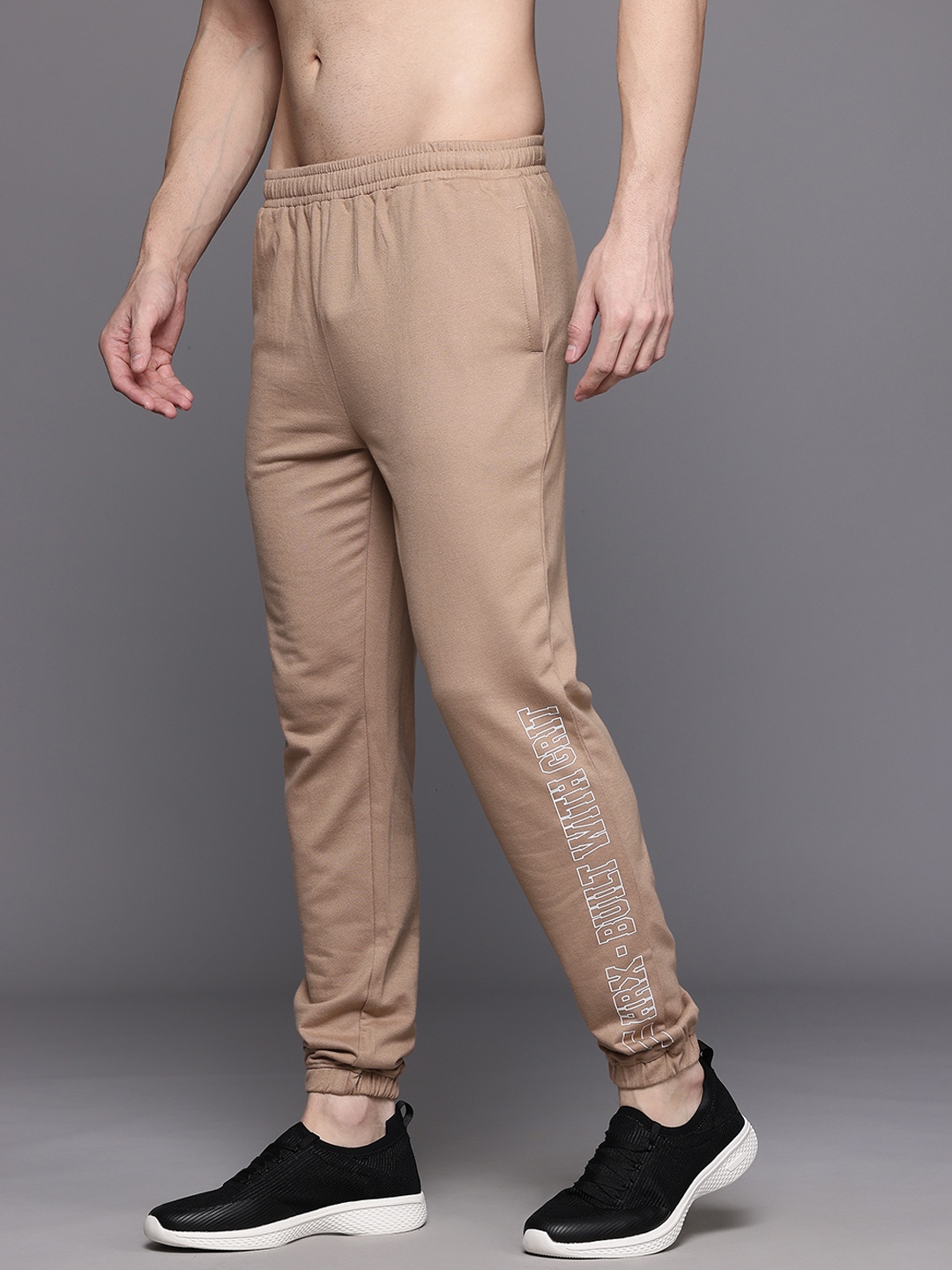 

HRX by Hrithik Roshan Men Typography Printed Training Jogger, Beige