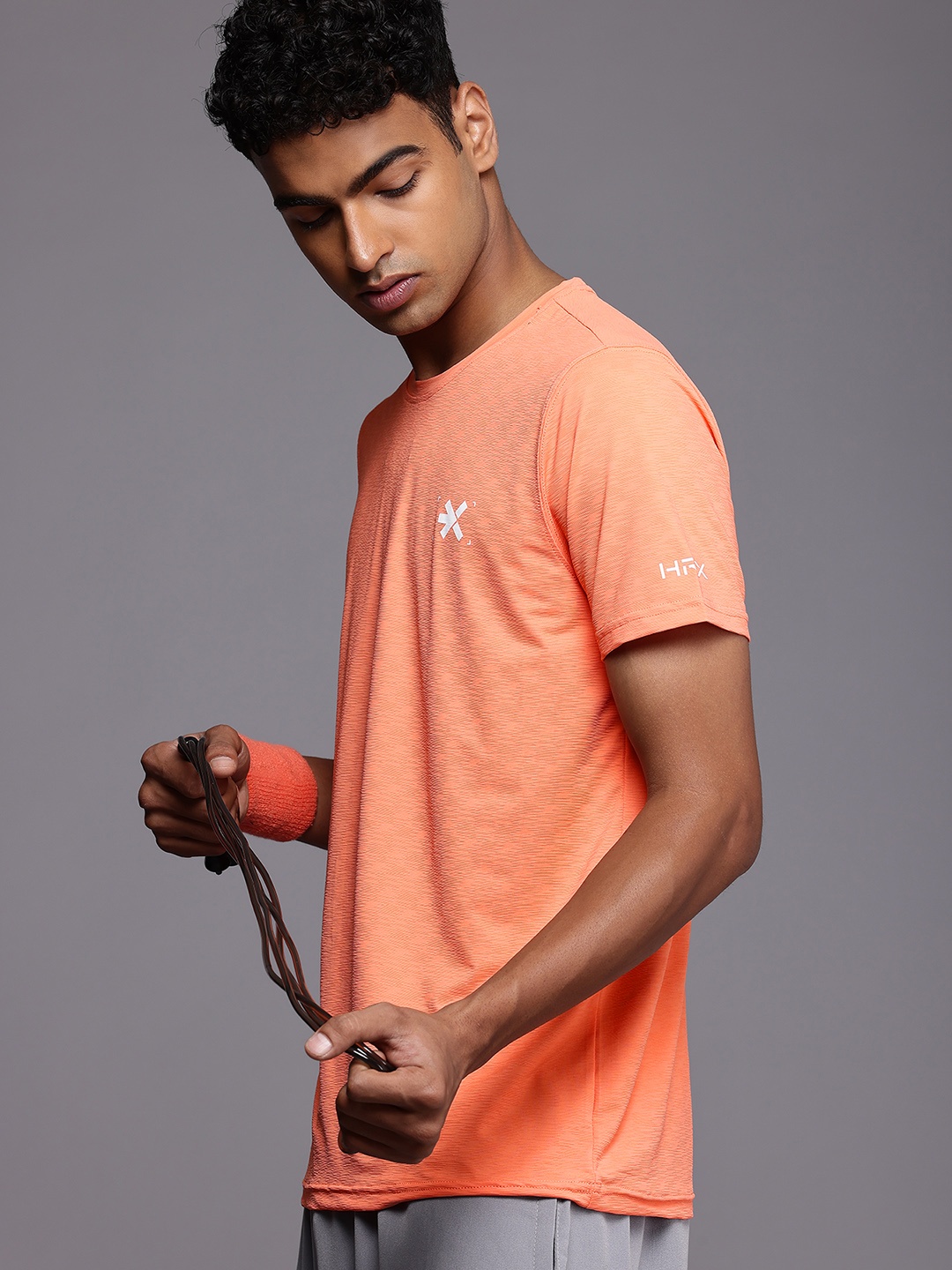 

HRX by Hrithik Roshan Sculptflex Self-Design Textured Training T-shirt, Peach
