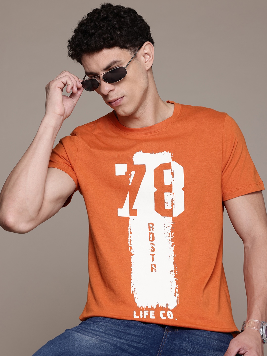 

Roadster Men Printed T-shirt, Orange