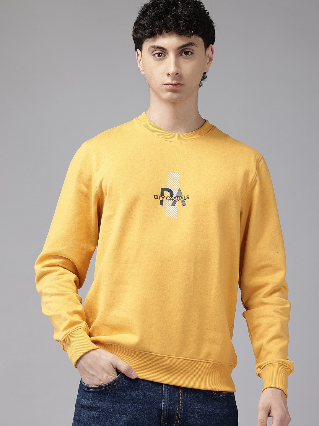 

Park Avenue Men Slim fit Printed Sweatshirt, Yellow