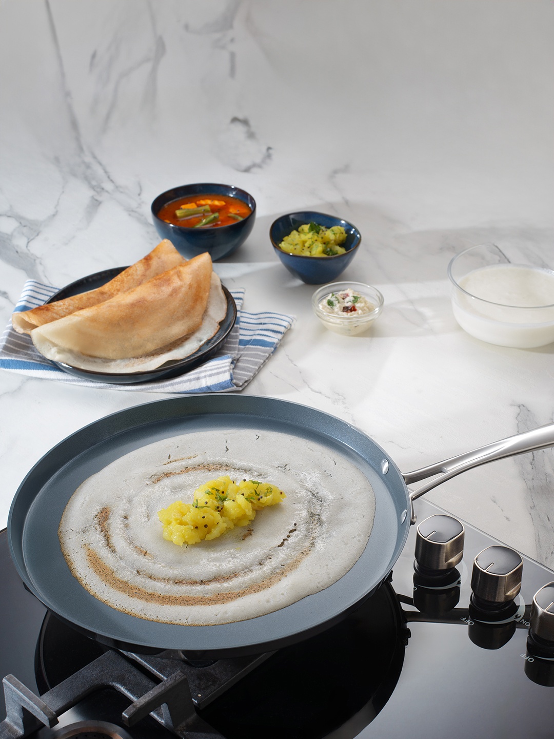 

Tramontina Fusao Non Toxic Stainless Steel Ceramic Triply Stay Cool Handle Dosa Tawa 30cm, Silver