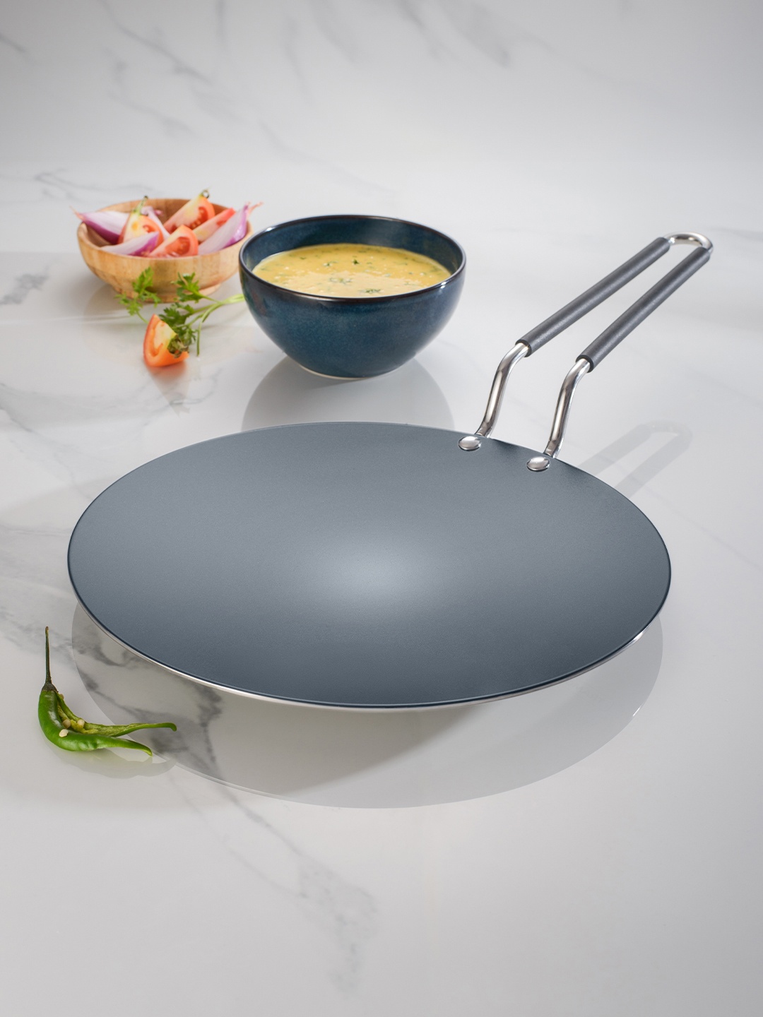 

Tramontina Fusao Non Toxic SS Ceramic Triply Concave Stay Cool Handle Tawa 26cm, Silver