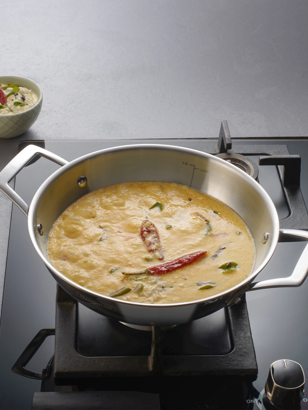 

Tramontina Aeion Non Toxic Stainless Steel Triply Induction Base Kadai with lid 30cm, Silver