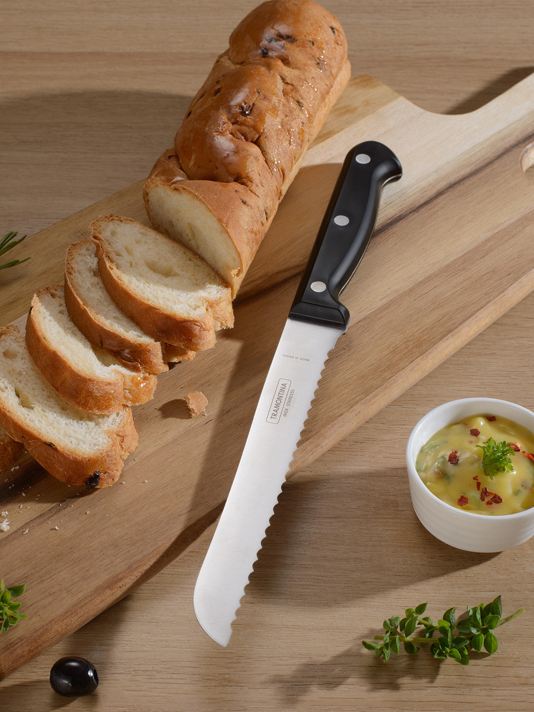 

Tramontina Ultracorte Stainless Steel Antimicrobial Serrated Edge Kitchen Knife 16.7cm, Black