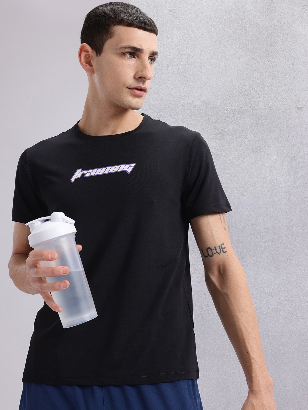

HRX by Hrithik Roshan Solid Running T-shirt with Typography Detail, Black