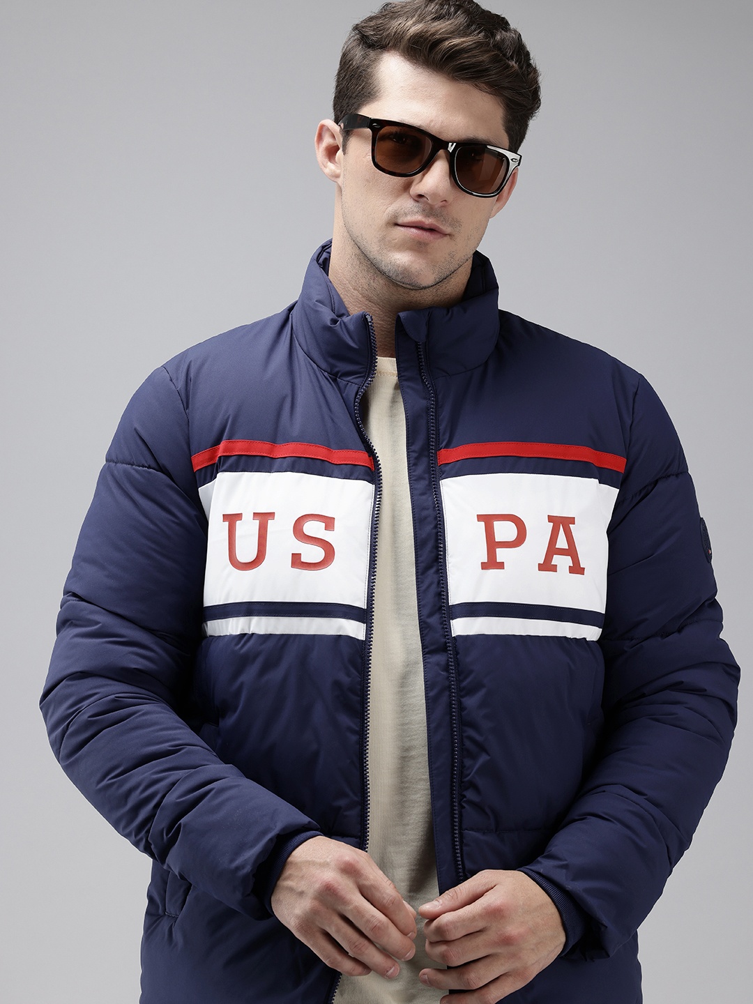 

U.S. Polo Assn. Stand Collar Brand Logo Printed Colourblocked Puffer Jacket, Navy blue