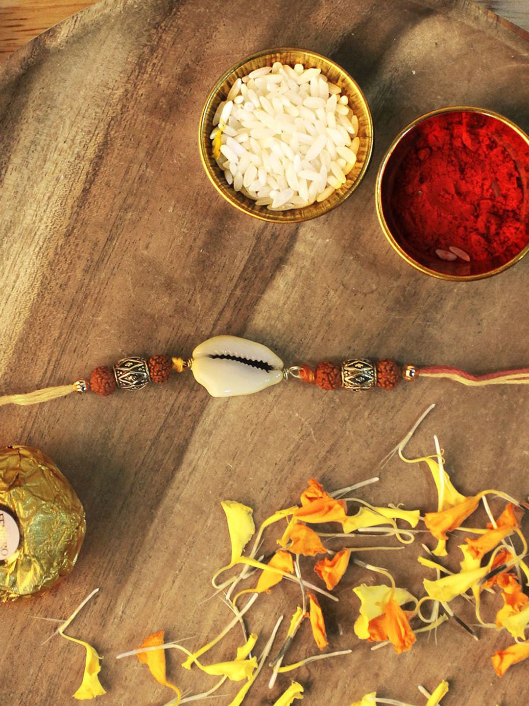 

Shubhanjali Rudraksha Thread Rakhi With Roli Chawal & Greeting Card, Yellow