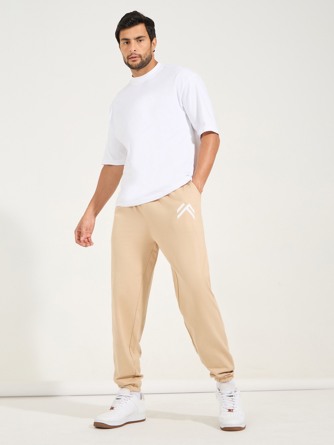 Styli Men Minimal Print Oversized Joggers with Elasticated Hem, Beige