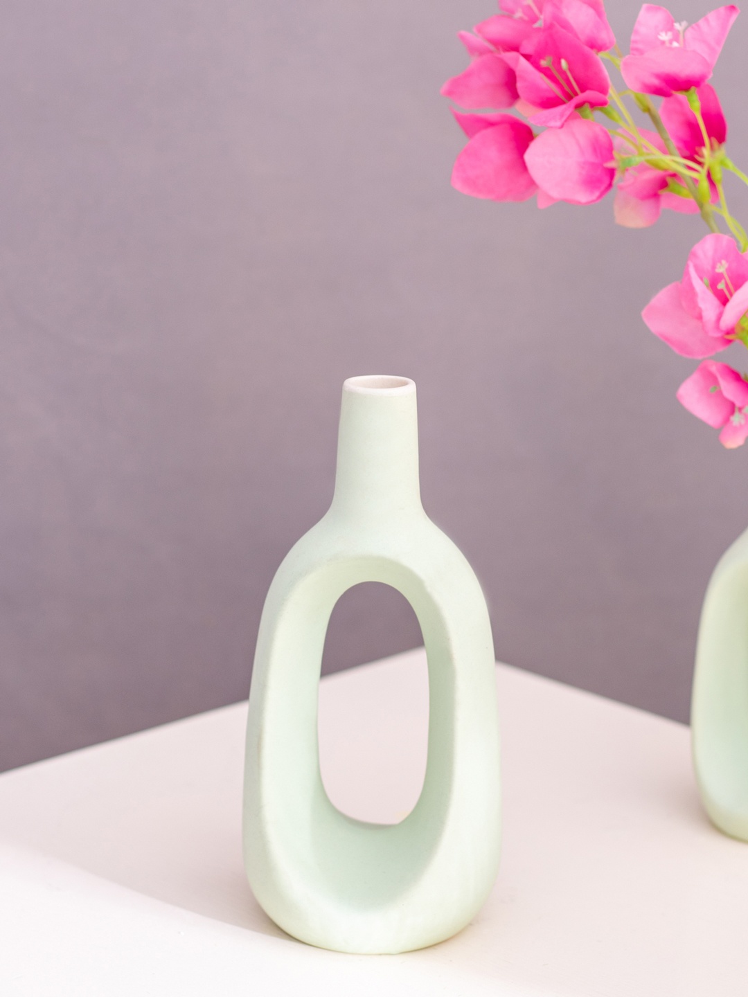 

The Decor Mantra Green Ceramic Flower Vase