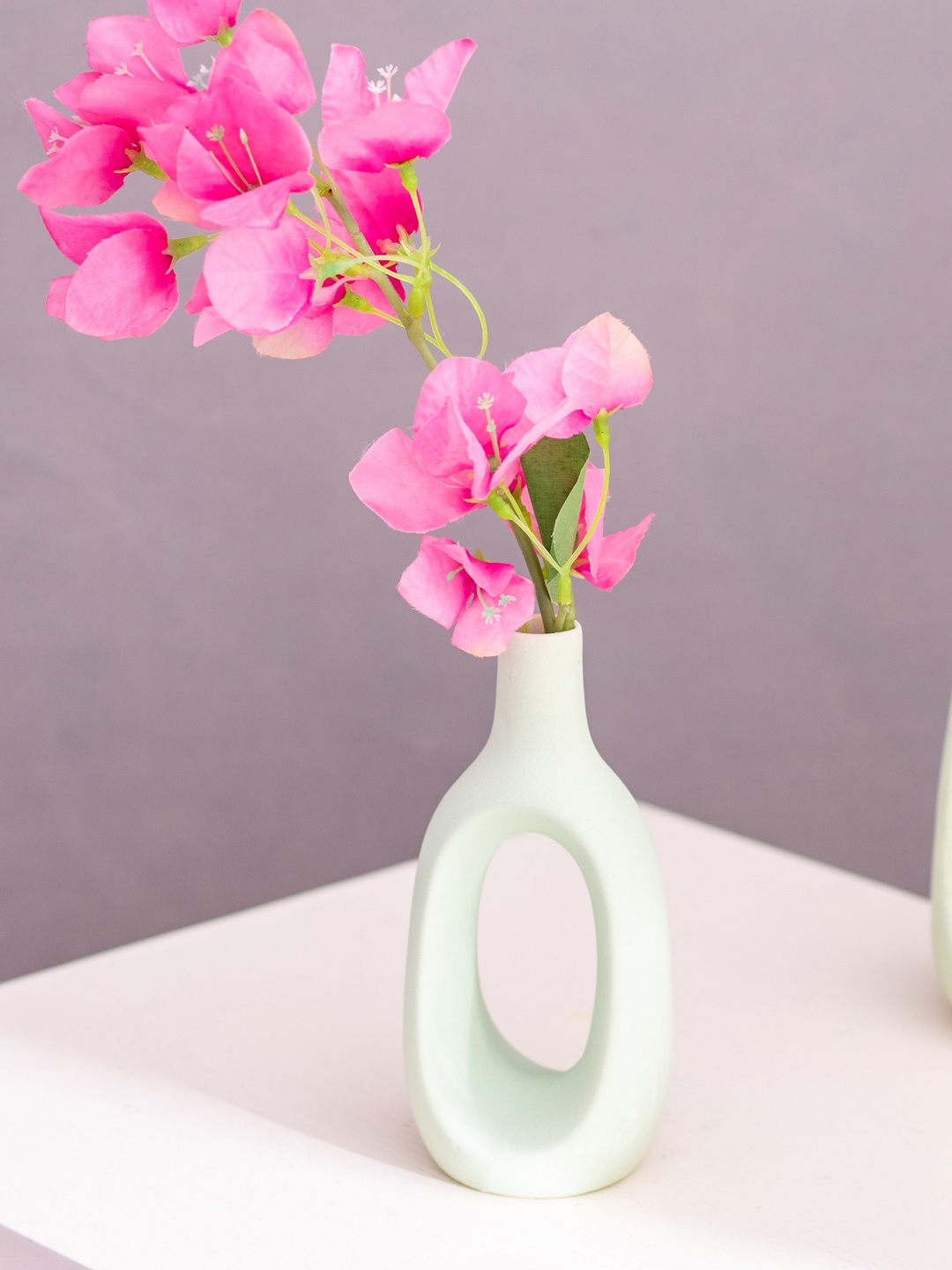 

The Decor Mantra Green Ceramic Bottle Shaped Flower Vase
