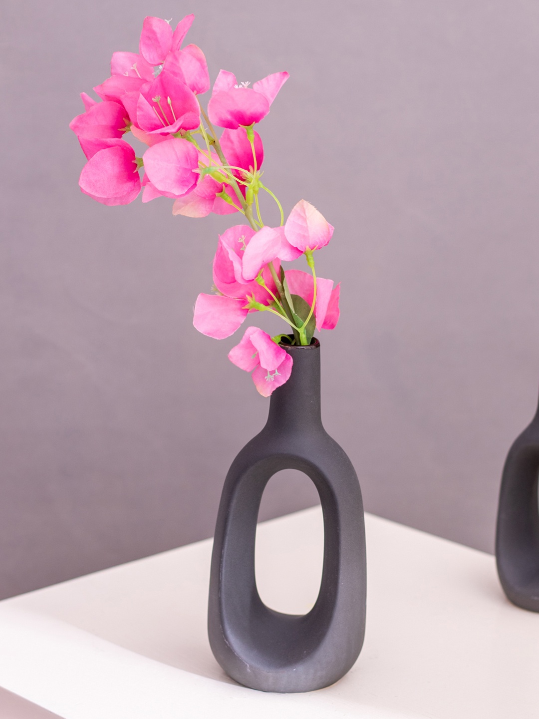 

The Decor Mantra Black Ceramic Bottle Shaped Flower Vase