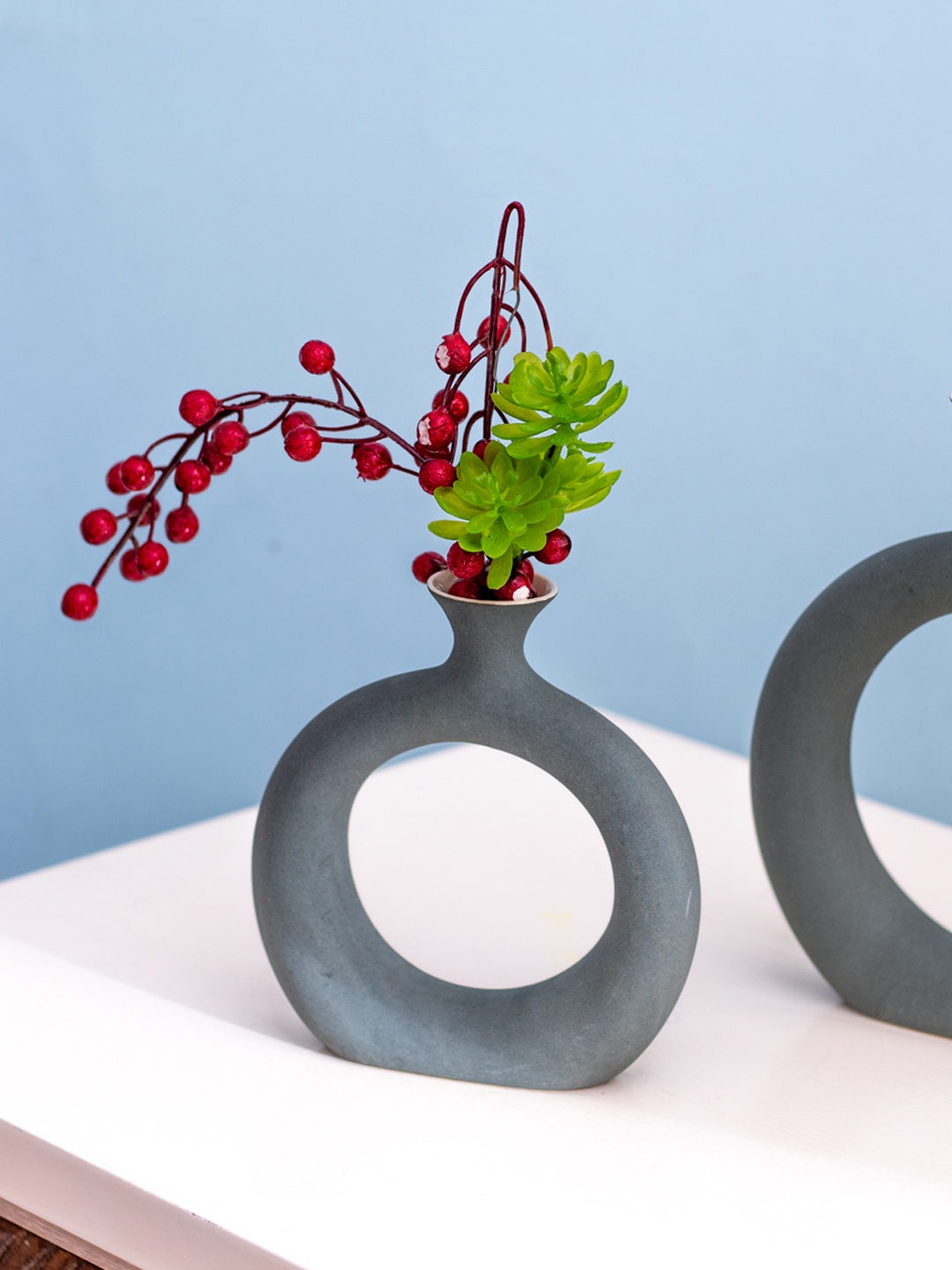 

The Decor Mantra Green Ceramic Donut Shaped Flower Vase