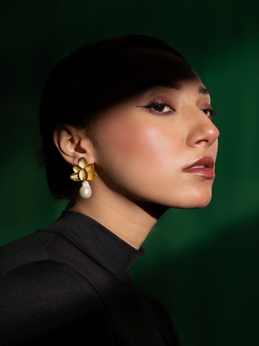 

Trupti Mohta Grace Goddess Gold Plated Pearl Beaded Leaf Shaped Drop Earrings