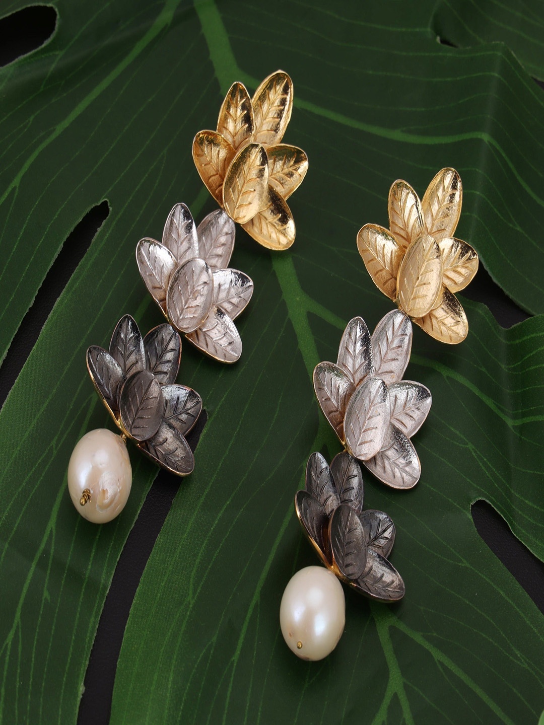 

Trupti Mohta Gold Plated Leaf Shaped Drop Earrings