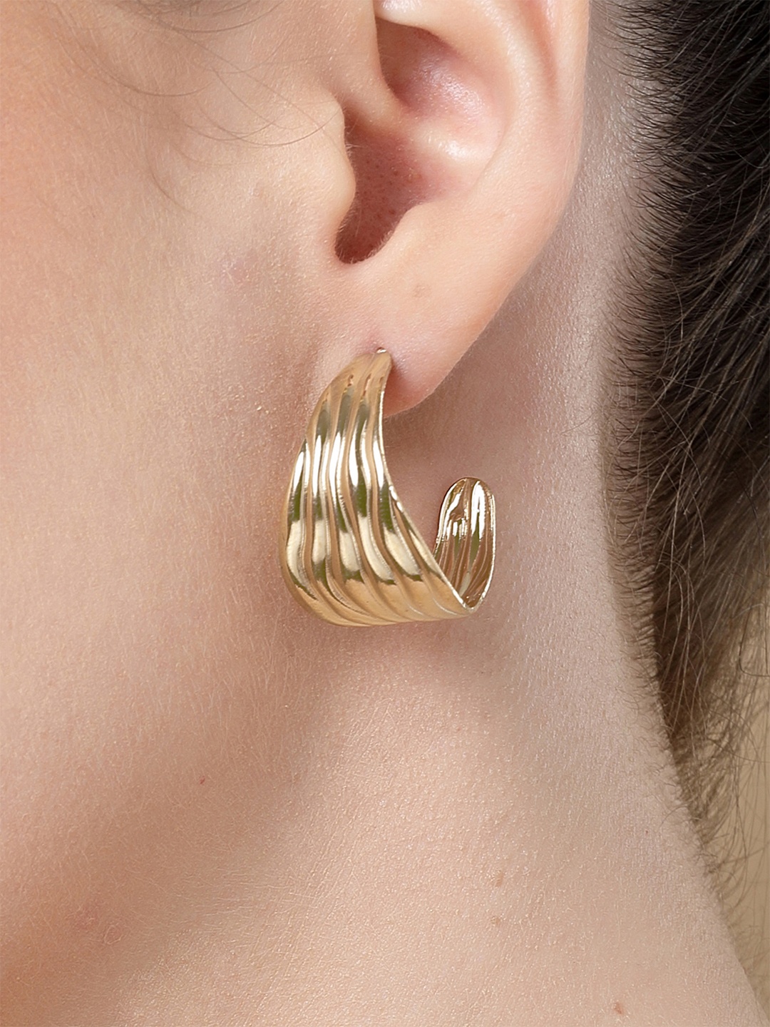

Bohey by KARATCART Gold Plated Textured Contemporary Half Hoop Earrings