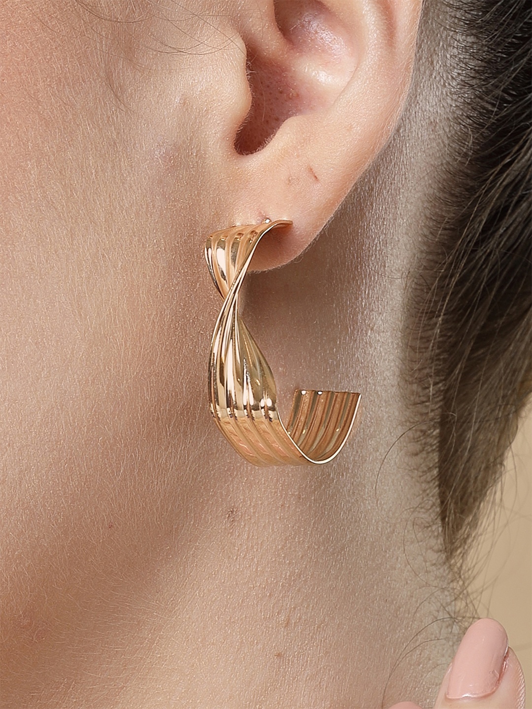 

Bohey by KARATCART Gold Plated Twisted Contemporary Half Hoop Earrings