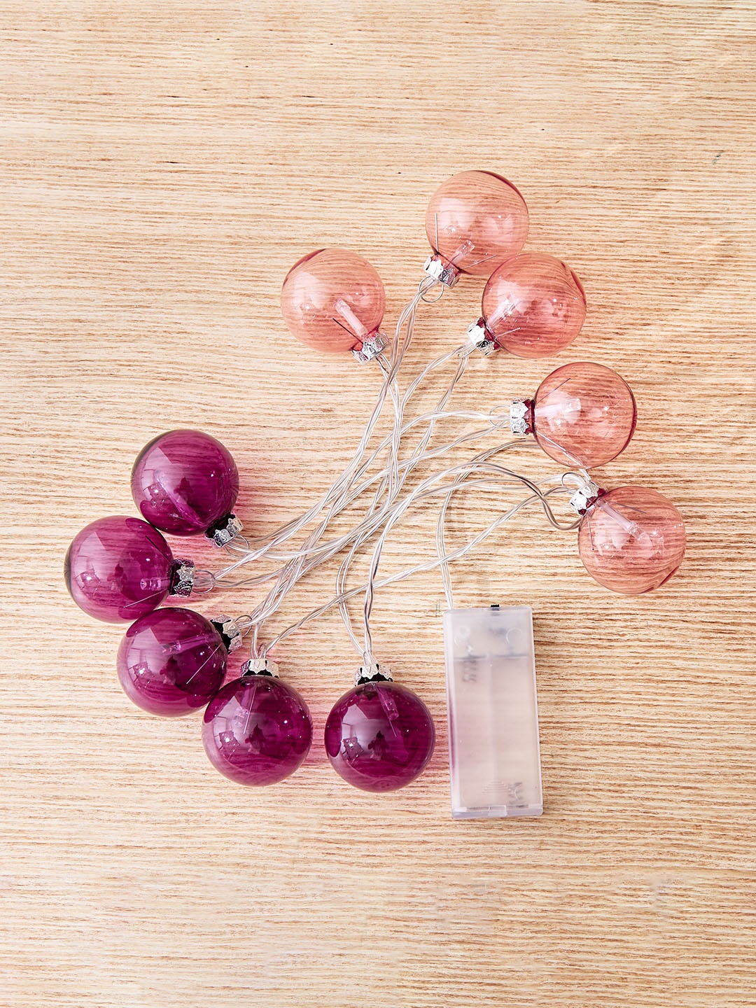 

Home Centre Serena Peach & Pink 10 Pieces Glass Ball Shaped String Lights