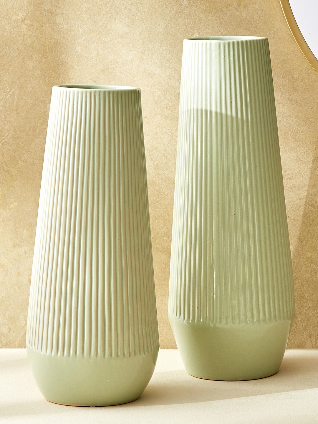 

Home Centre Splendid Goldcrest Green Textured Ribbed Ceramic Vase