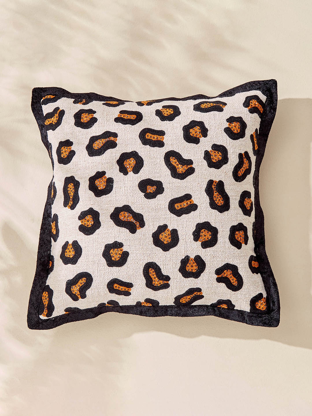 

Home Centre Plushify Beige & Black Embellished Square Cushion Cover