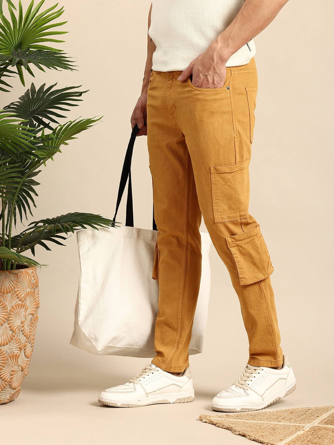 

Mast & Harbour Men Tapered Fit Stretchable Jeans, Mustard