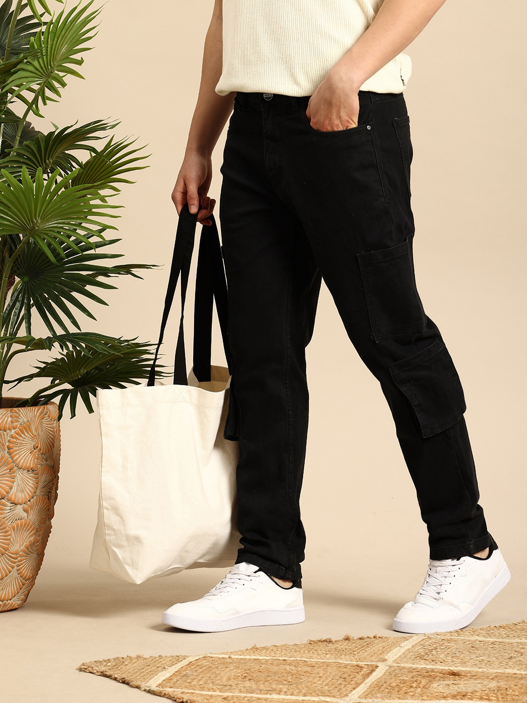 

Mast & Harbour Men Tapered Fit Cargo Style Stretchable Jeans, Black